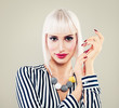 Fashion Portrait of Cute Woman with Blonde Hair and Manicure Hands Fashion Portrait of Cute Woman with Blonde Hair and Manicure Hands