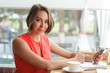 business woman in the cafe typing by mobile phone business woman in the cafe typing by mobile phone