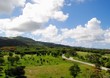 Scenic landscaped gardens and golf course with Mt. Tapochao in the side. Saipan, Northern Mariana Islands Scenic landscaped gardens and golf course with Mt. Tapochao in the side. Saipan, Northern Mariana Islands