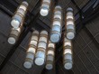 Artistic chandelier tubes of light covered with native decoration hanging from the ceiling Artistic chandelier tubes of light covered with native decoration hanging from the ceiling