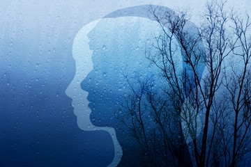 Sadness in Life Concept, Present by Silhouette Shape of Man and Woman combinated with Old Dry Tree and Rain, Blue Filter Effect