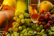 Grape wine and bright pumpkins, grapes and apples. close-up. holiday halloween Grape wine and bright pumpkins, grapes and apples. close-up. holiday halloween
