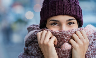 Woman feeling cold in winter