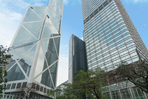 directly below of modern financial skyscrapers in central Hong Kong,blue toned,china.