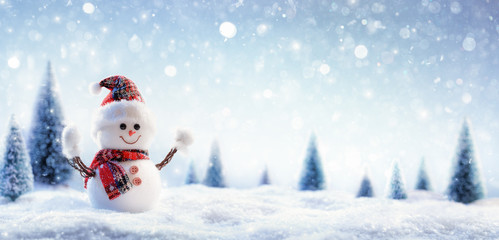 Snowman In Wintry Landscape