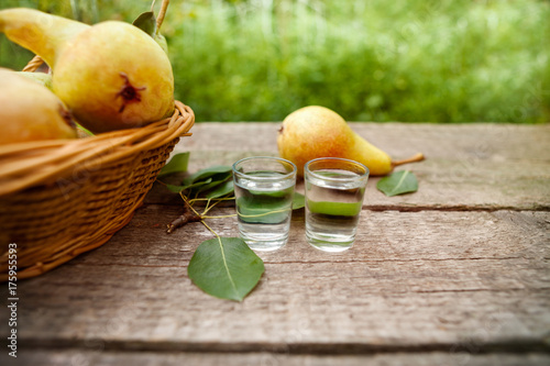 Pear brandy.Shot glass with pear brandy.