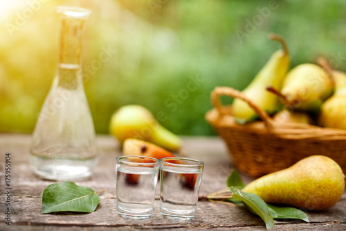 Two shot glass with pear brandy