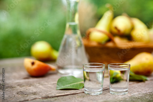 Pear alcohol drink in shot glass