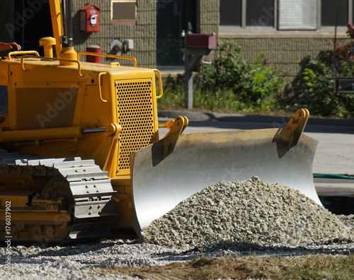 Close up on bulldozer in construction site