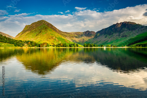Stunning sunset at lake in District Lake in summer