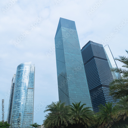 directly below of modern financial skyscrapers in central Hong Kong,blue toned,china.