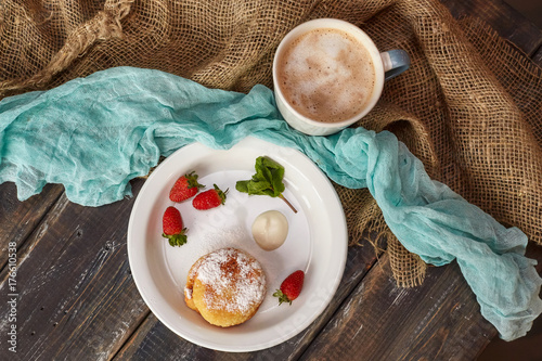 Breakfast with pancakes, strawberry and latte coffee, top view
