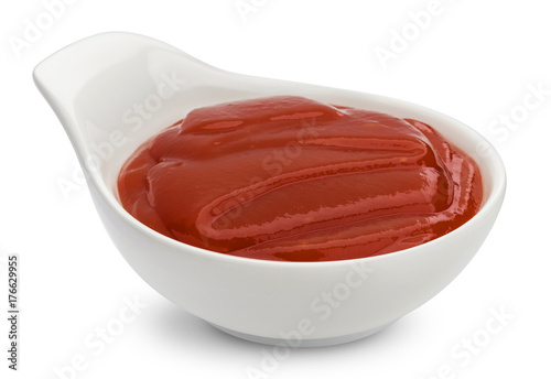 Bowl of ketchup isolated on white background