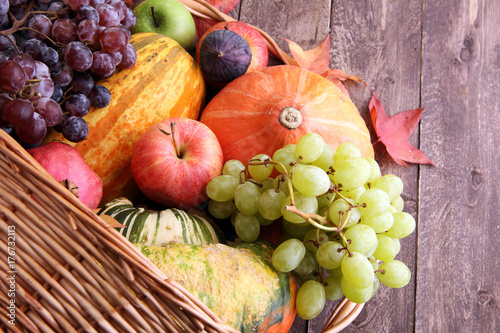 Autumn nature concept. Fall fruit and vegetables on wood. Thanksgiving dinner.