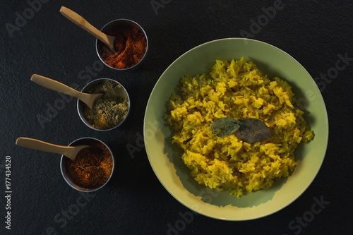 Delicious food in plate with various spices