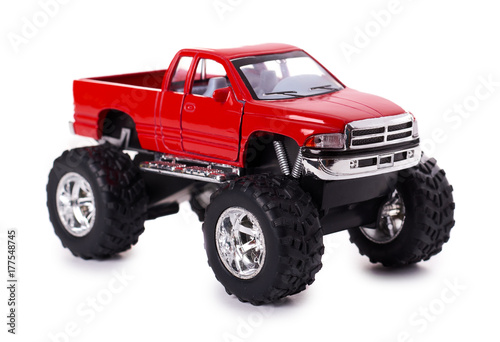 Plakat duży metal czerwony samochód zabawka offroad z kołami potwora na białym tle