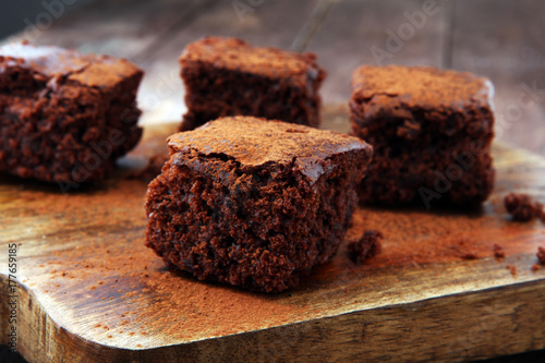 Cake chocolate brownies on wooden background with mint