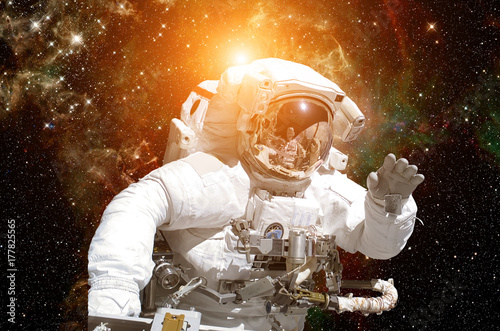 Astronaut in outer space. Elements of this image furnished by NASA.