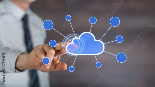 Man touching a cloud networking on a touch screen