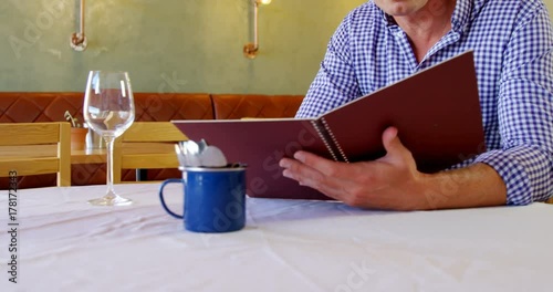 Man checking out the menu 