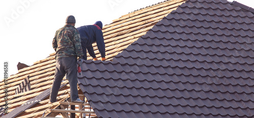workers working on the roof