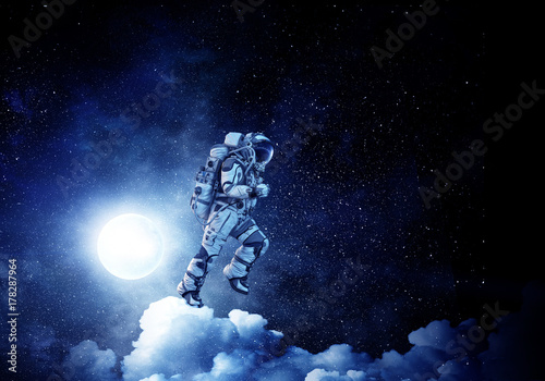 Spaceman run on clouds. Mixed media