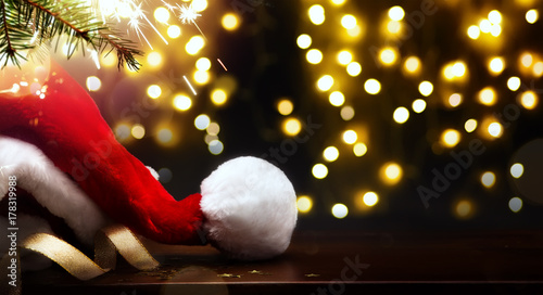 merry Christmas and happy New year; tree light and Santa hat