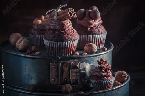 Delicious chocolate cupcake made of cream and nuts