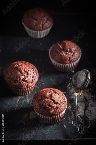 Delicious and homemade chocolate muffin with caster sugar