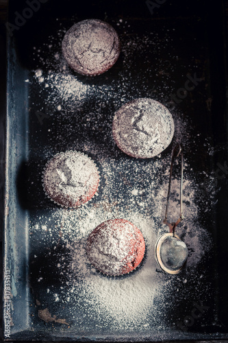 Fresh and tasty chocolate muffin with caster sugar