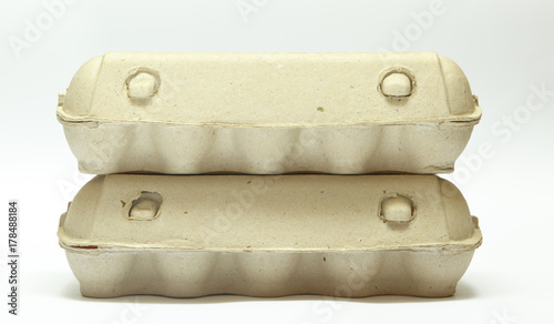 Egg boxes isolated on white background.
