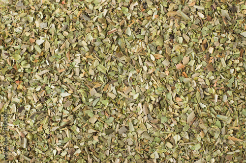 dried oregano spice as a background, natural seasoning texture