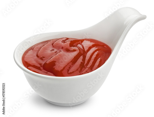 Bowl of ketchup isolated on white background