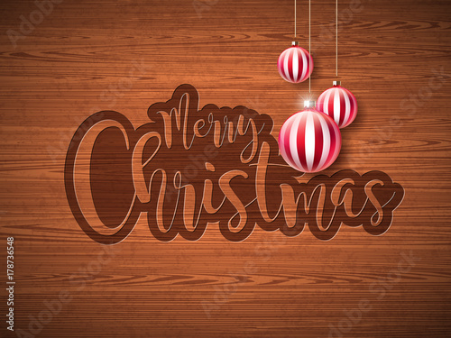 Merry Christmas Hand Lettering Illustration with Paper Label and Red Ornamental Glass Balls on Vintage Wood Background. Vector EPS 10 Holiday Design.
