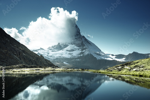 Reflection of Matterhorn in lake Riffelsee, Zermatt, Switzerland