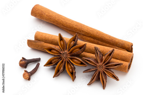 Cloves, anise and cinnamon isolated on white background.