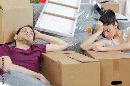troubled young couple during move out process