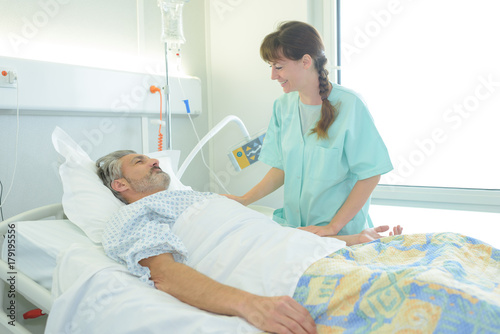 man patient sleeping in hospital bed