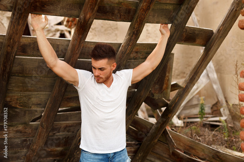 Attractive guy with strong arms