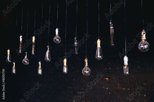  Decorative antique edison style light bulb On dark background. Lighting decor.