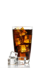 Glass of cola with ice cubes on white background