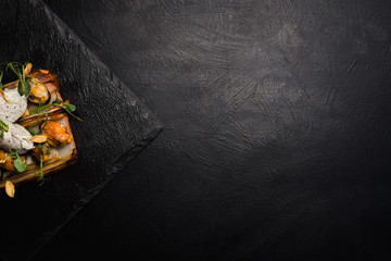 restaurant gourmet food on dark background. free space concept. delicious delicacy