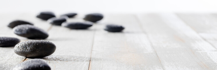 massage black pebbles for spirituality, ayurveda, beauty spa or yoga