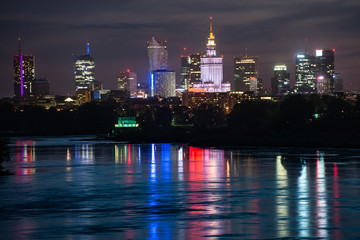 Night panorama of Warsaw waterfront and downtown skyline