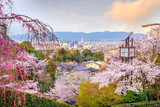 Kyoto city skyline with sakura