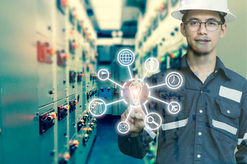 Industrial innovation technology and industry 4.0 concept. Double exposure of engineer man pointing finger with digital icon tools for deverlop business concept
