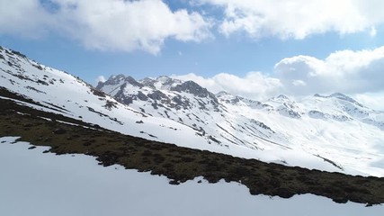 hiking,trekking activity in snowy mountains on the summit