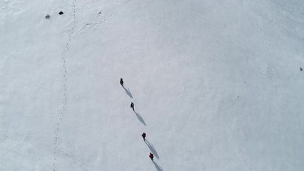hiking,trekking activity in snowy mountains on the summit
