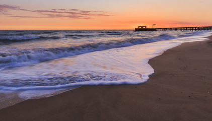 The coast of the Caspian Sea at sunset