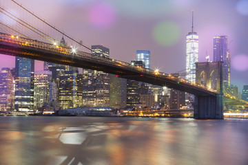 View of Brooklyn Bridge by night, NYC.